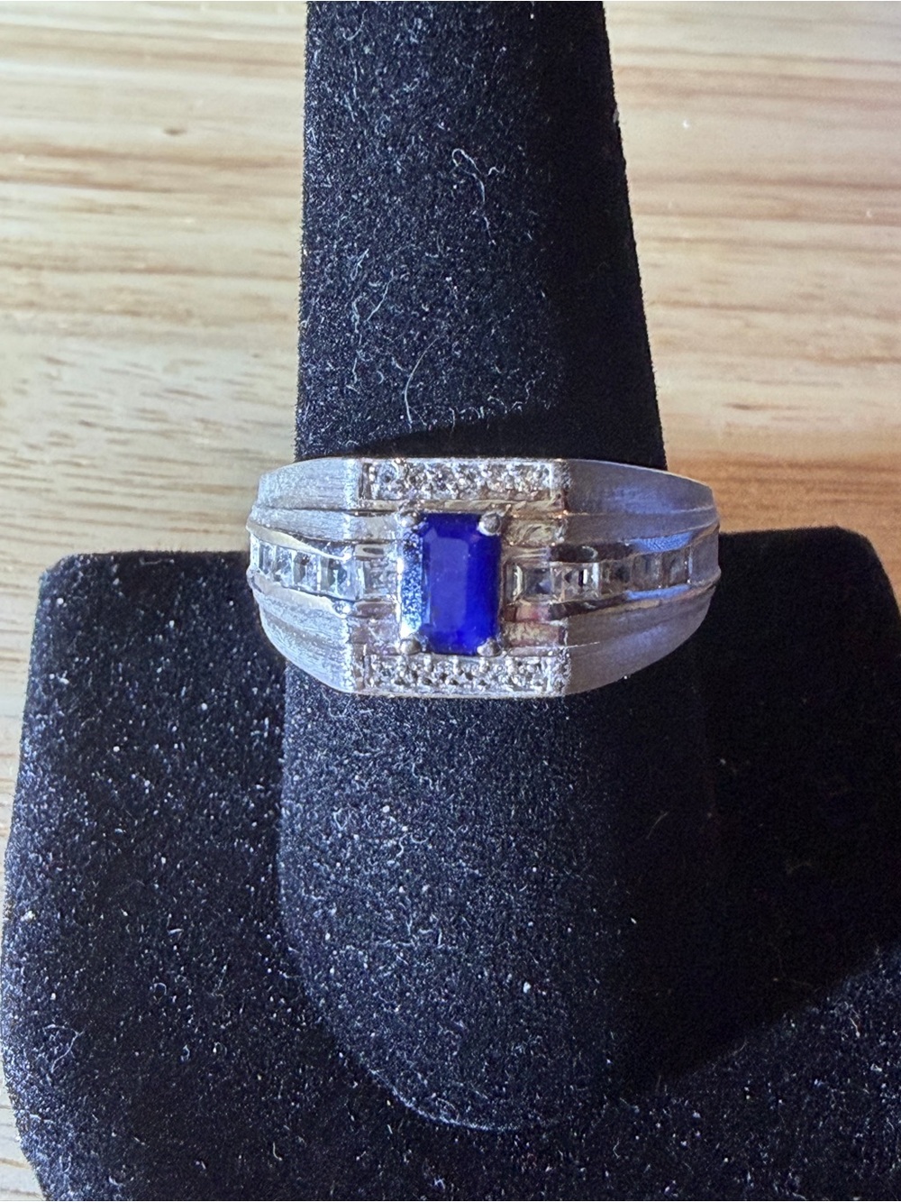 Men’s Blue Sapphire Sterling Silver Ring with White Topaz Accents.
